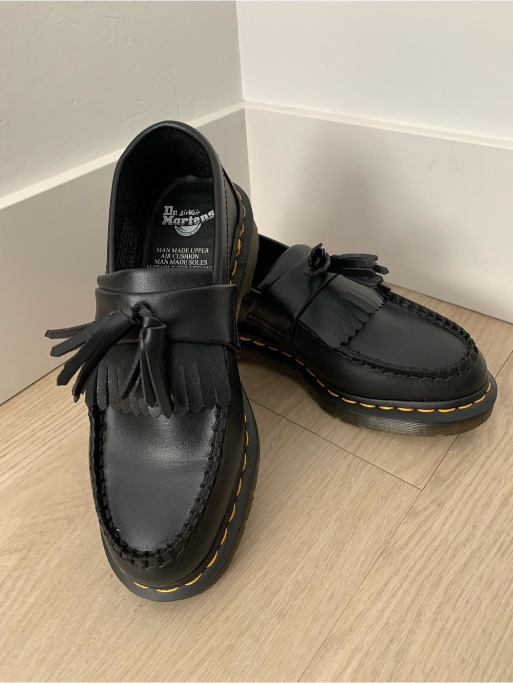 Dr. Martens Black Tassel Kiltie Slip-On Loafers with Yellow Stitching